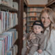 Mom holding her son in a library