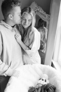 Mom and dad looking at their newborn son